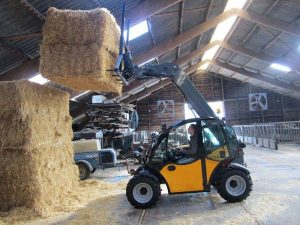 Hydraulic system and manifold blocks for wheel loader and telehandlers